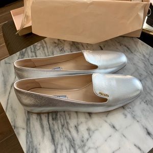 Brand New. Never Worn. Prada Flats - Silver.